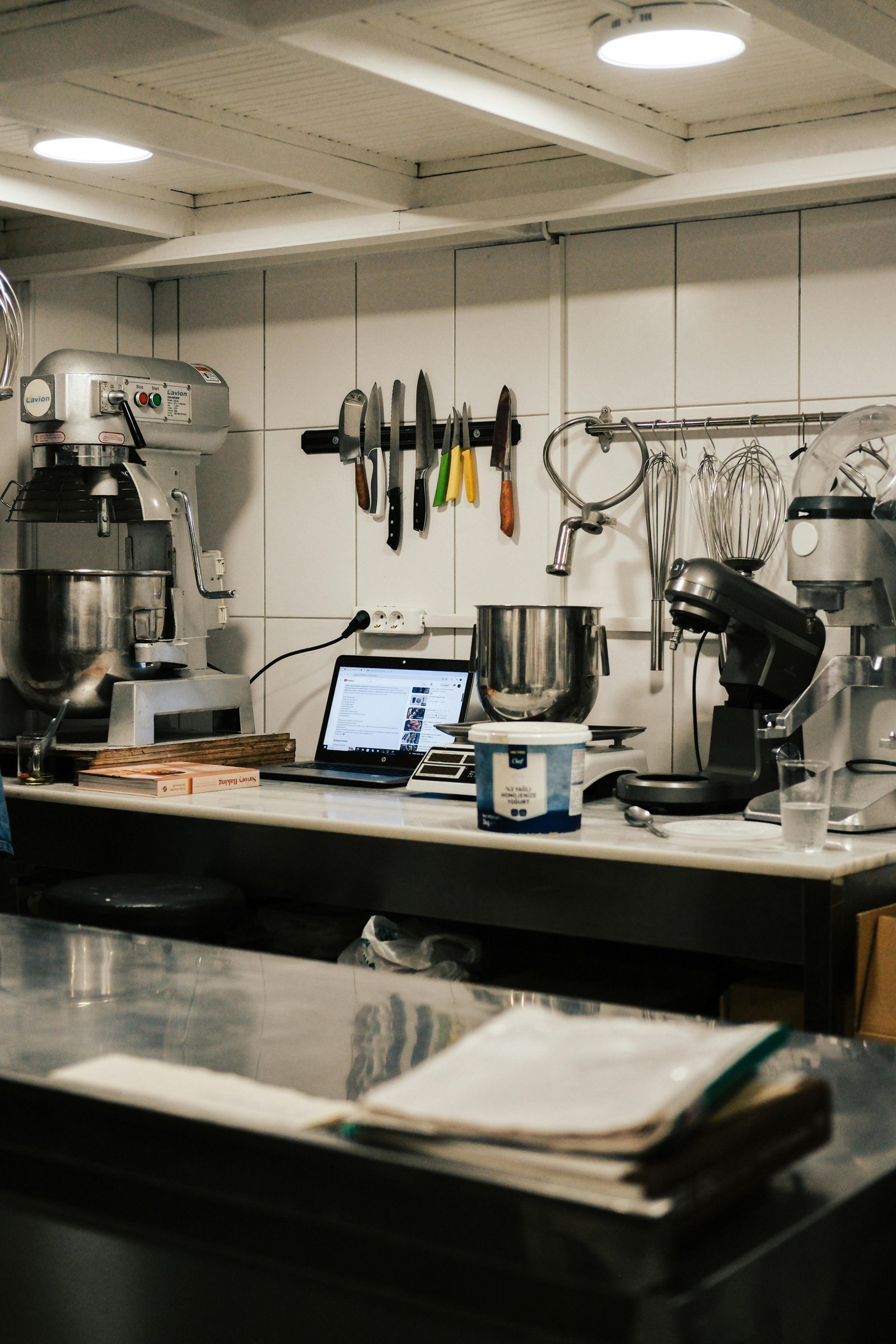 Professional commercial kitchen with stainless steel catering equipment