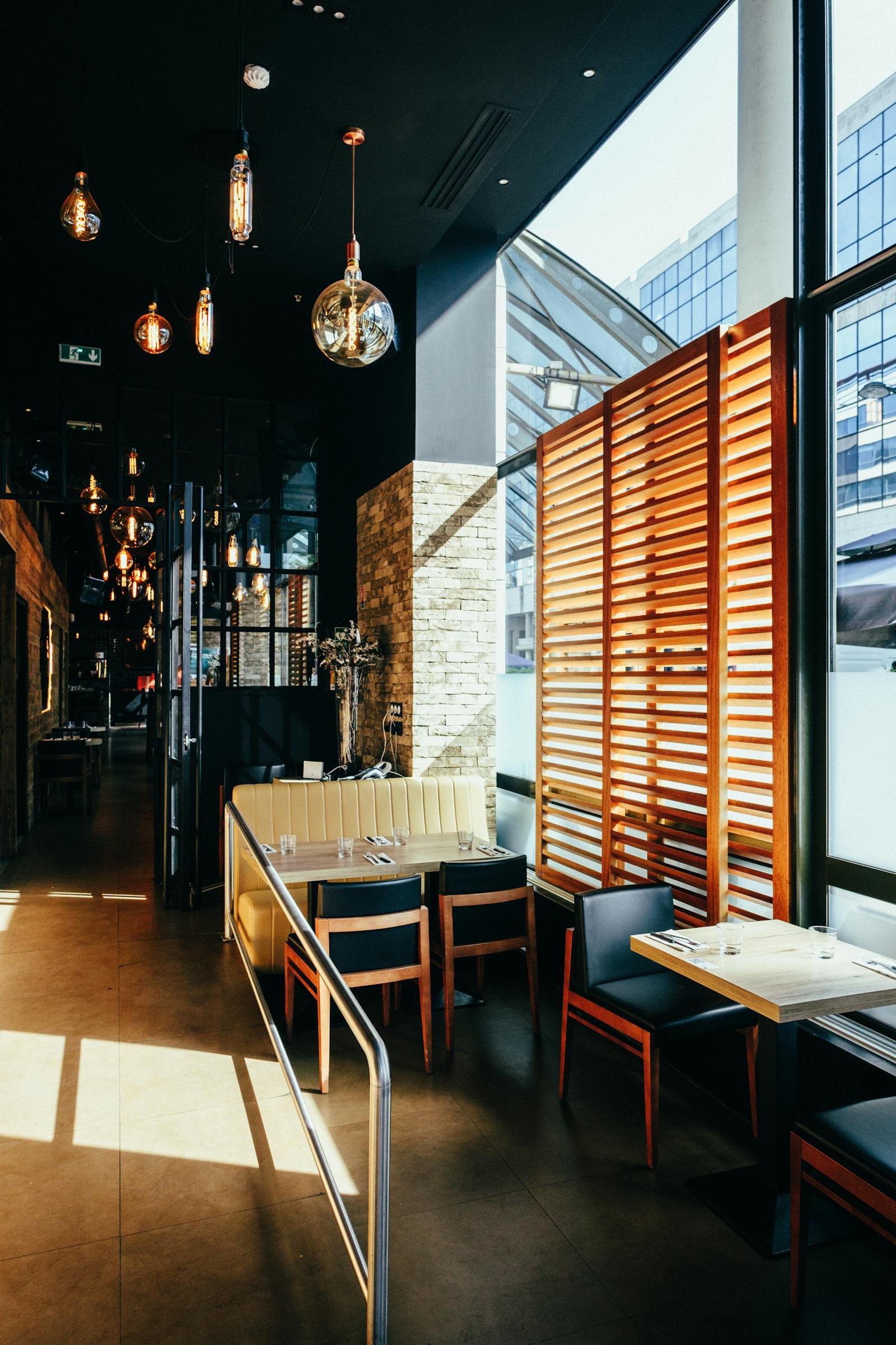 Restaurant tables and chairs in a hospitality interior